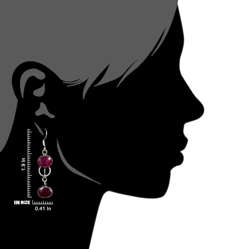 Side view of the artisan made Pink Tourmaline Dangle Earrings revealing the texture and light play