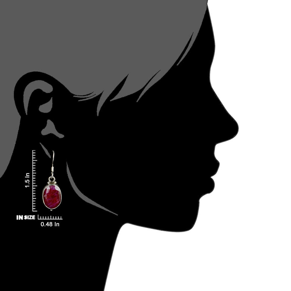 Side view of the artisan made Pink Tourmaline Oval Drop Earrings revealing the texture and light play