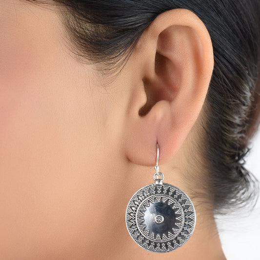 Round dangle earrings in oxidised 925 silver with handcrafted finish