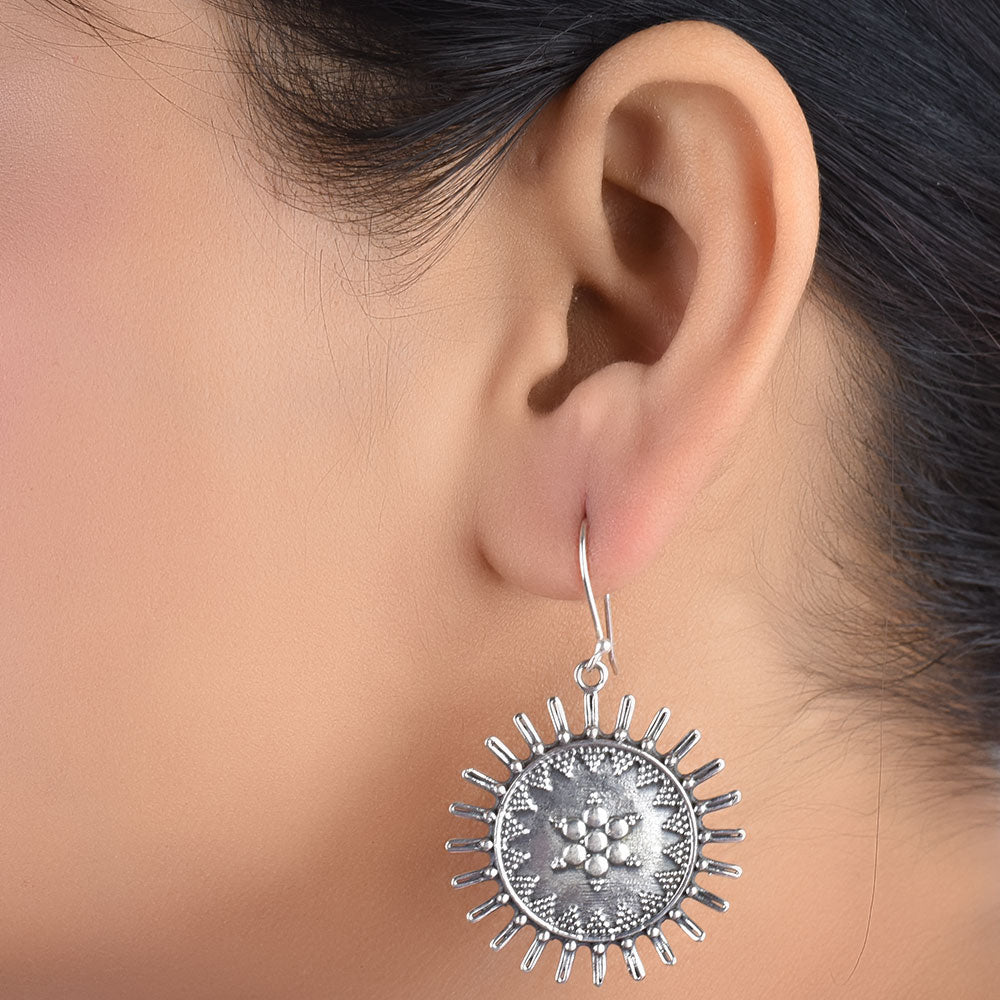 Front view of surya dangle sun flower dangle earrings in 92.5 Sterling Silver