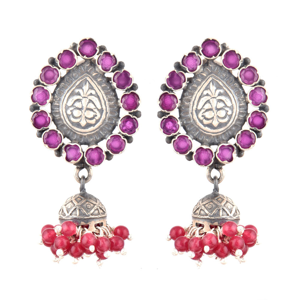 Floral-inspired silver drop earrings set with pink tourmaline