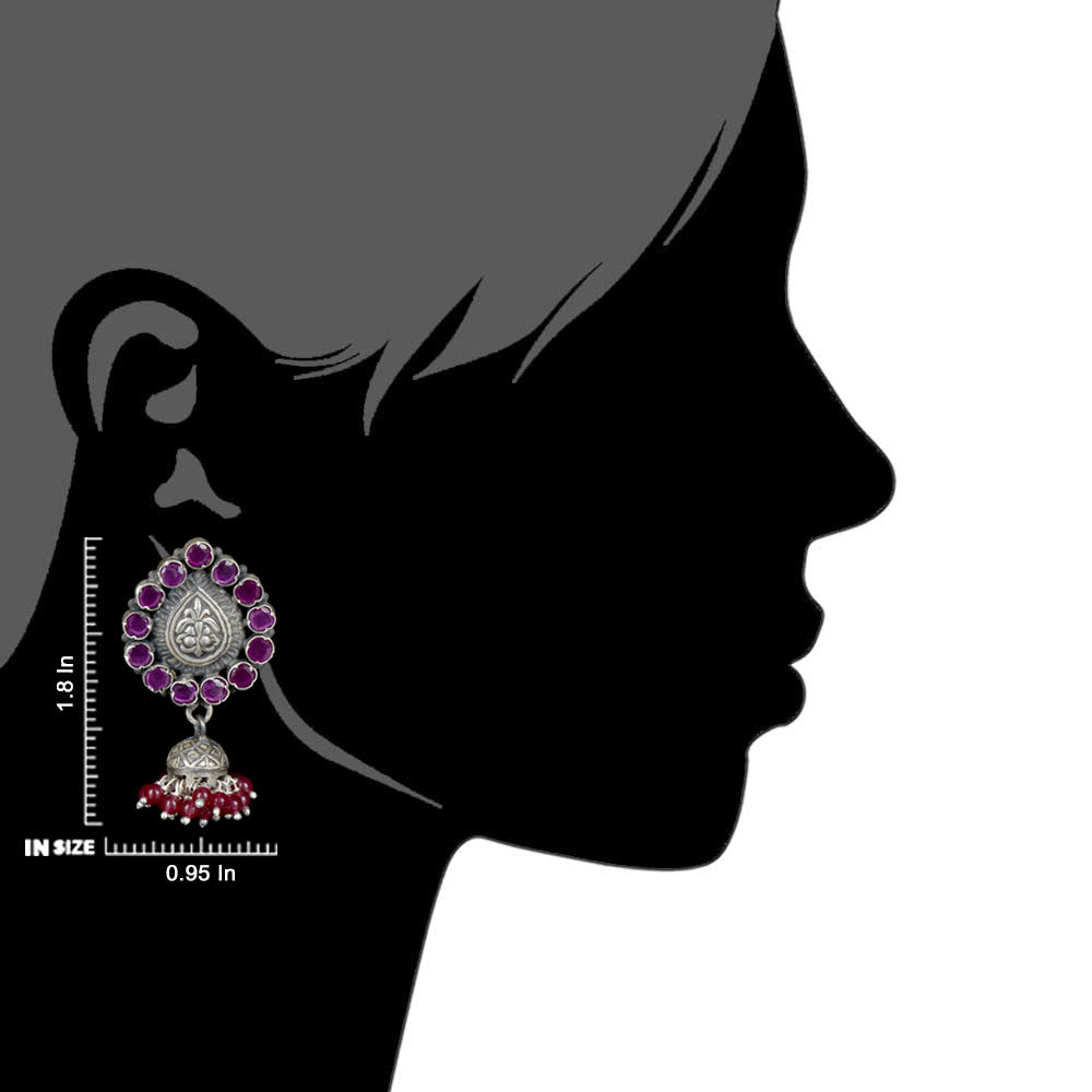 Close-up of pink tourmaline floral earrings in sterling silver