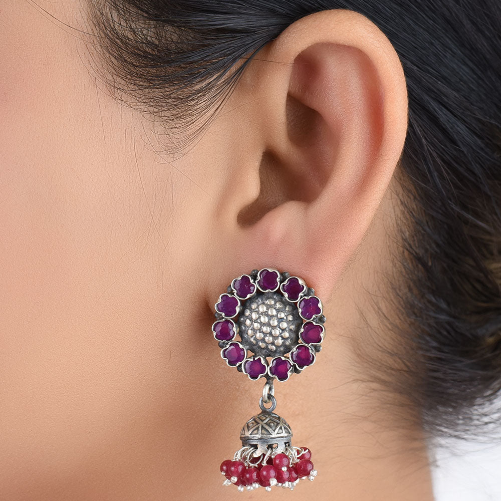 Pink tourmaline sun motif earrings crafted in 925 sterling silver