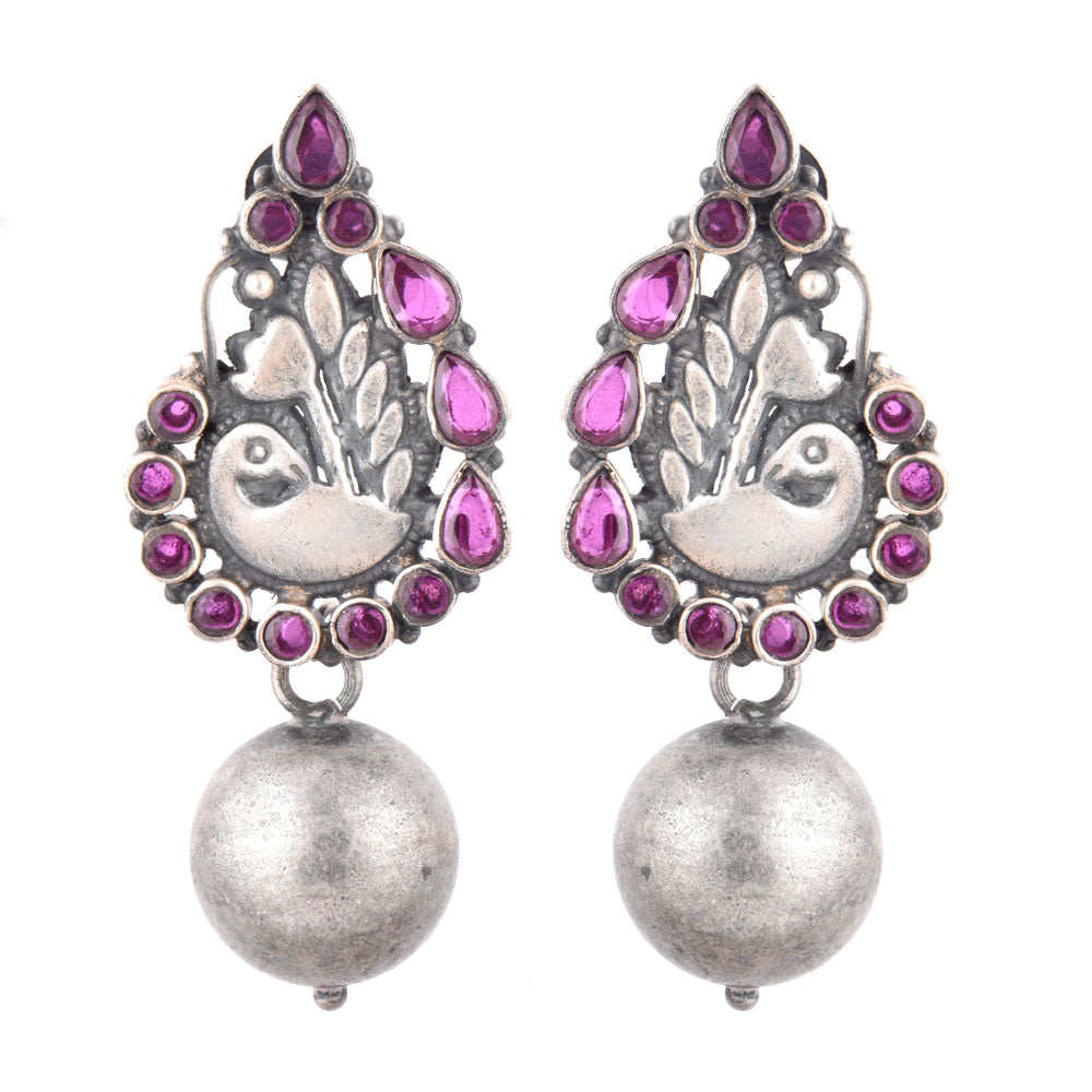 Morni tourmaline silver stud earrings featuring peacock motif and purple gemstone