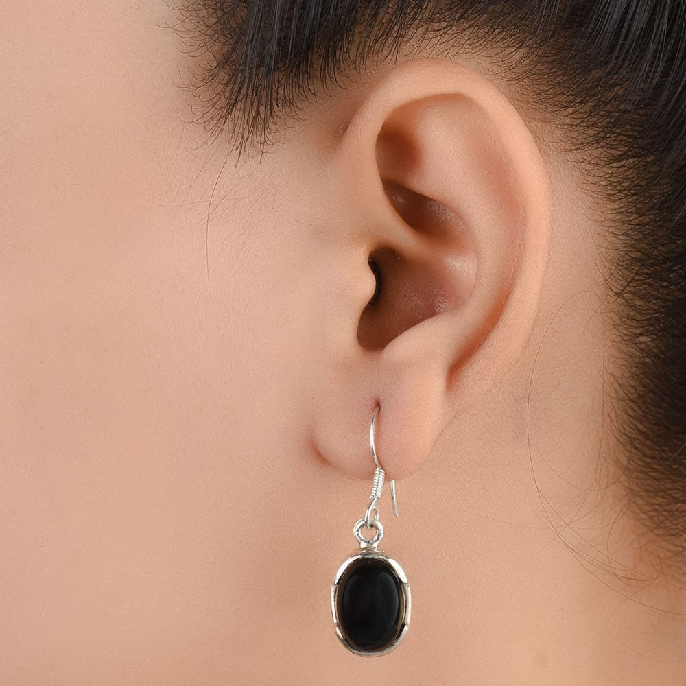 Close up of Noir Onyx earrings in 92.5 Sterling Silver
