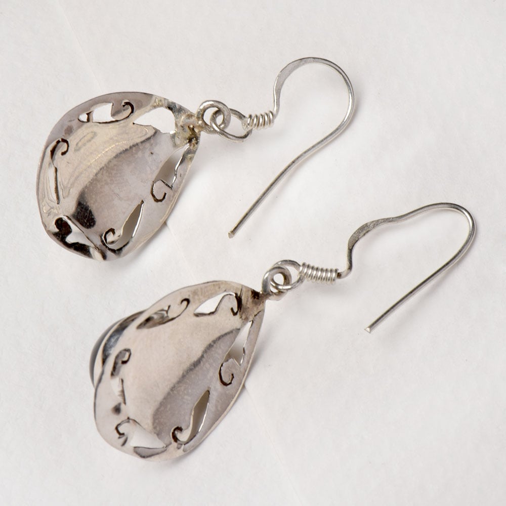 Angled view of Noir Onyx earrings in 92.5 Sterling Silver