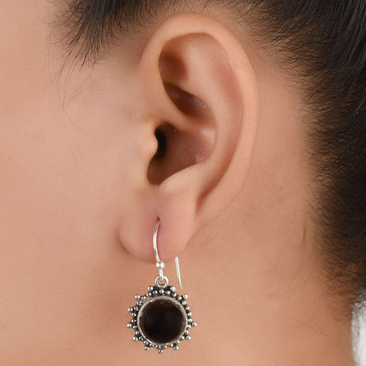 Overhead view of Gul earrings in 92.5 Sterling Silver