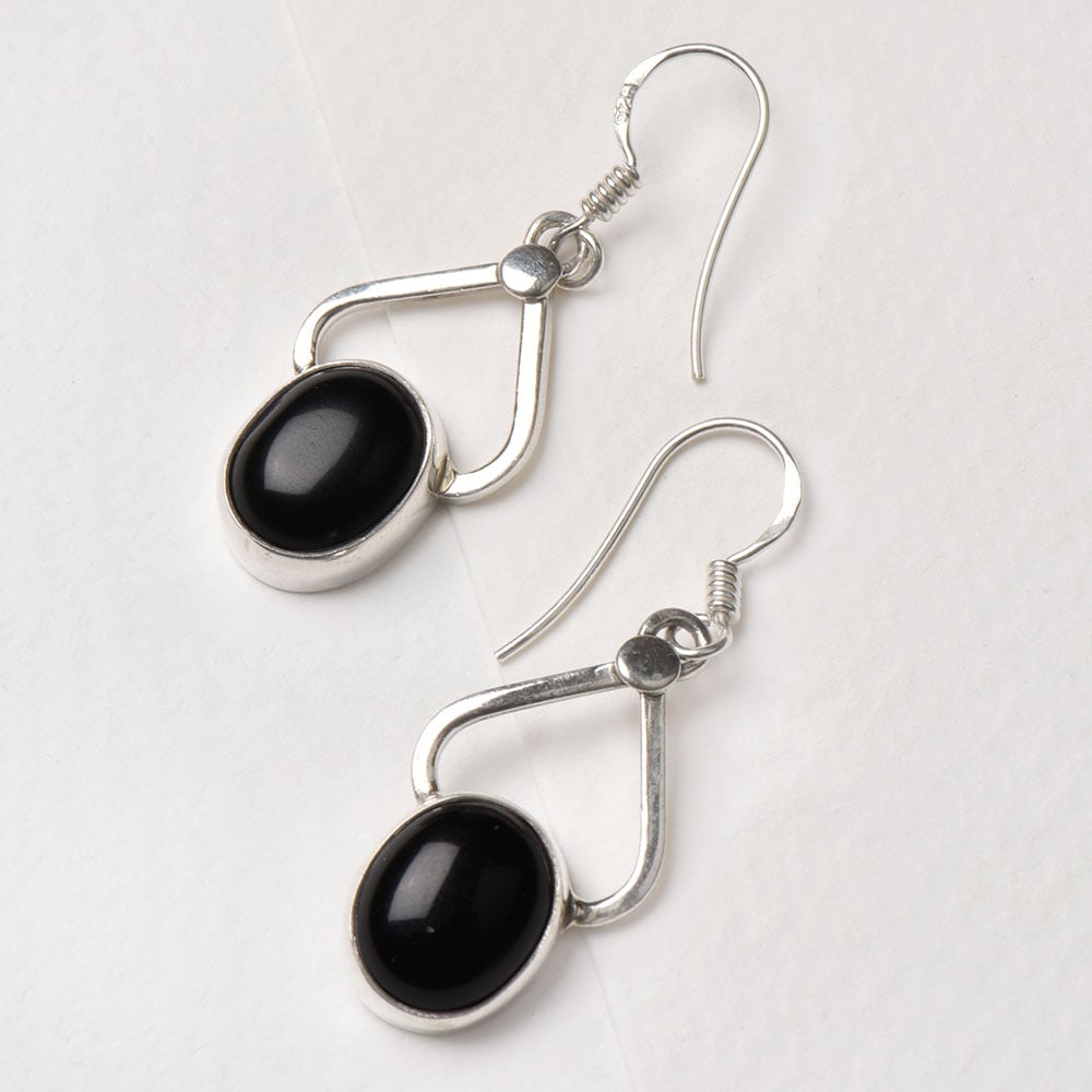 Angled view of Reet earrings in 92.5 Sterling Silver