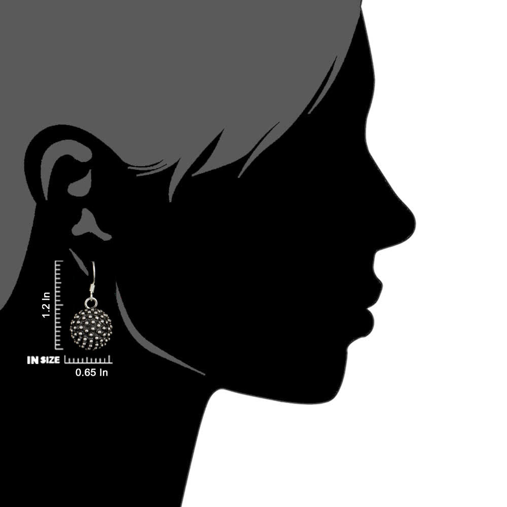 Side view of the artisan made Black Berry Fruit Drop Earrings revealing the texture and light play