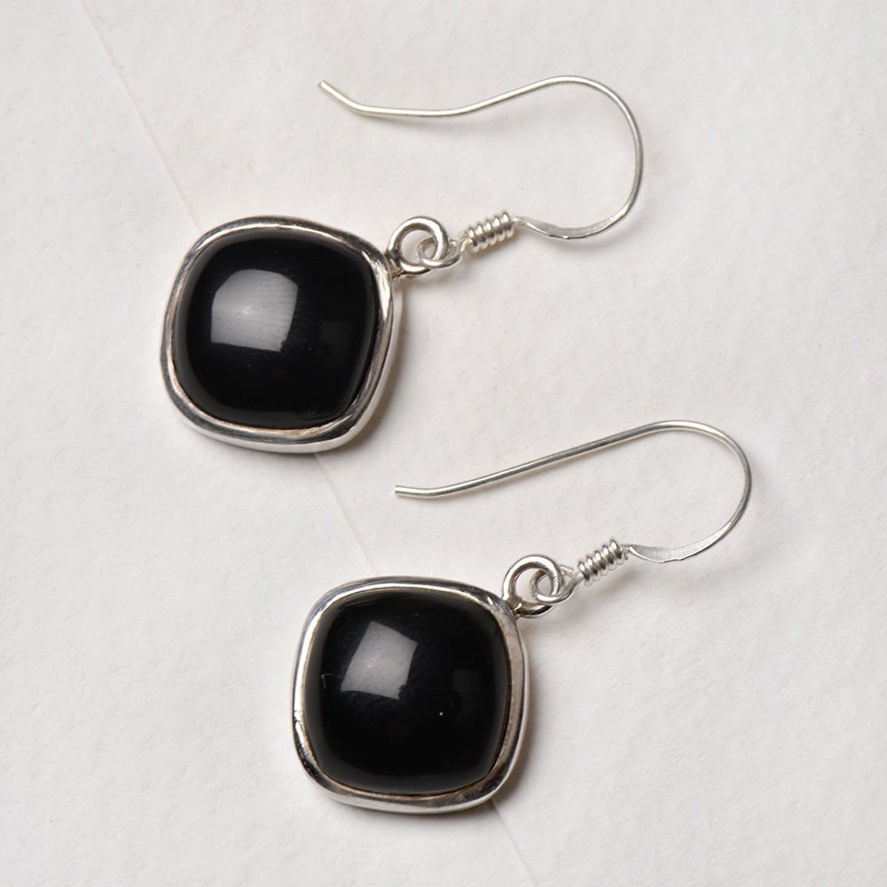 Closeup of Black Onyx Square Drop Earrings showcasing the detailed drop motif and 92.5 Sterling Silver finish