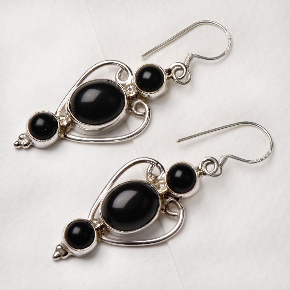 Closeup of Black Onyx Dangle Earrings showcasing the detailed dangle motif and 92.5 Sterling Silver finish