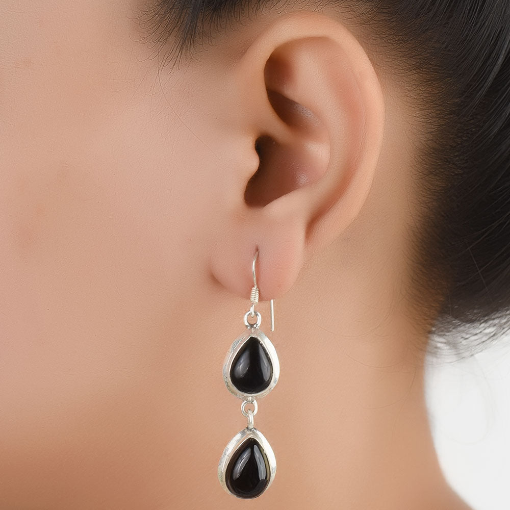 Black Onyx Oval Dangle Earrings handcrafted in 92.5 Sterling Silver with subtle Black Onyx details capturing quiet heritage