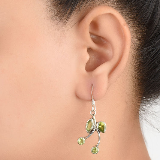 Angled view of Neel Topaz earrings in 92.5 Sterling Silver