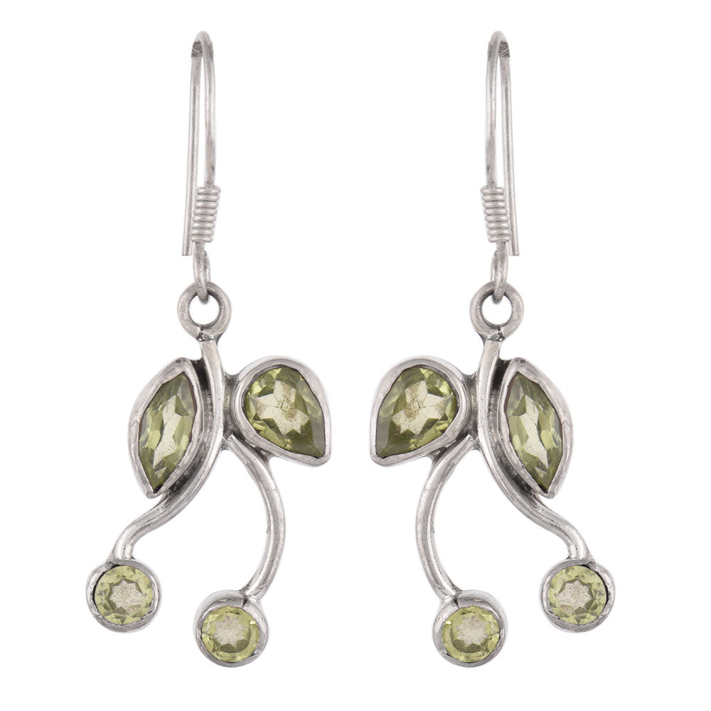 Close up of Neel Topaz earrings in 92.5 Sterling Silver