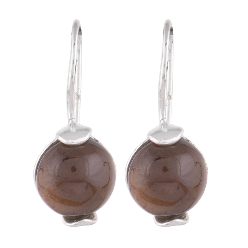 Close up of Dhoop Citrine earrings in 92.5 Sterling Silver