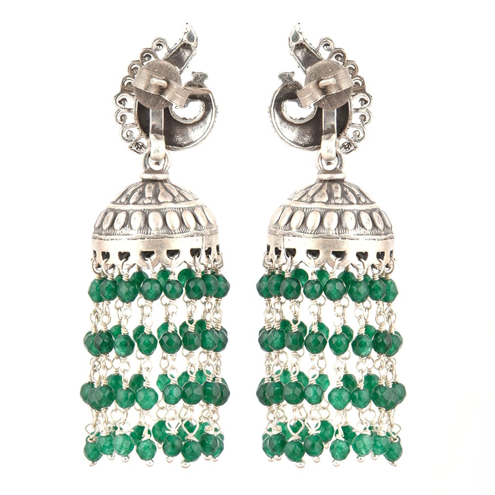 Close-up of intricate chaandni engraving with green onyx accents