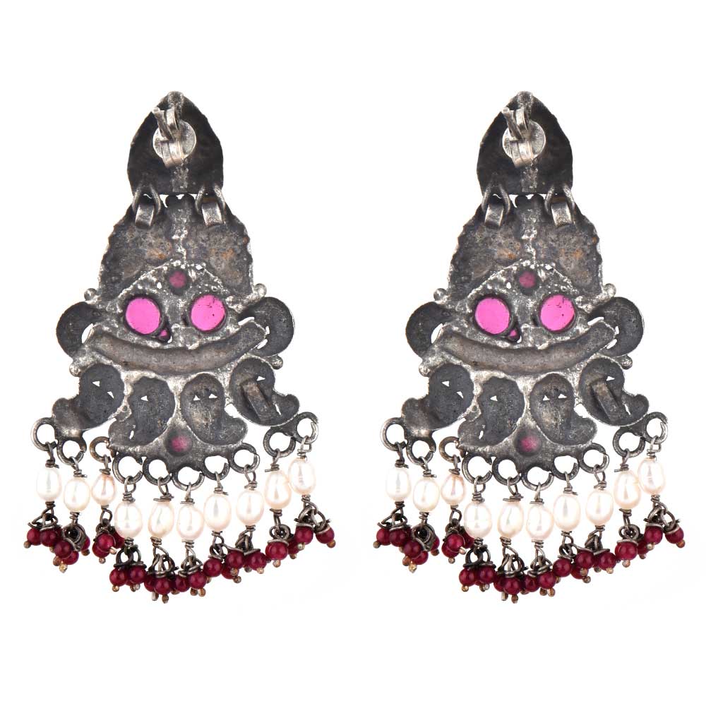 Side angle showing Pearl & Agate Peacock shape and texture