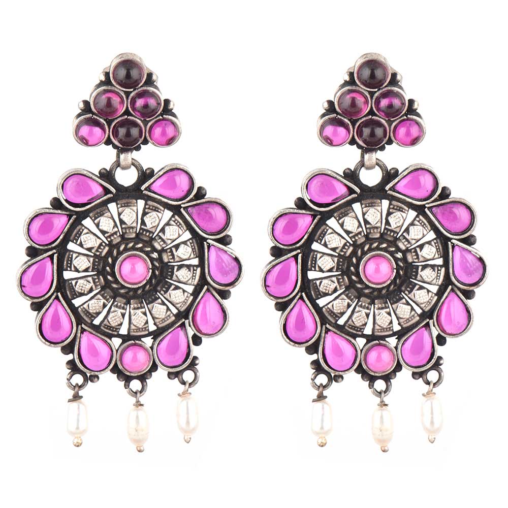 Side profile showing the handcrafted floral motif and sapphire pearl detail