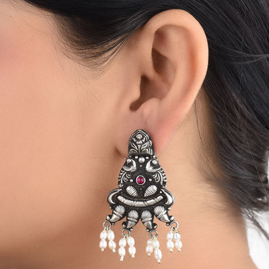 Front view of peacock amethyst peacock dangle earrings in 92.5 Sterling Silver