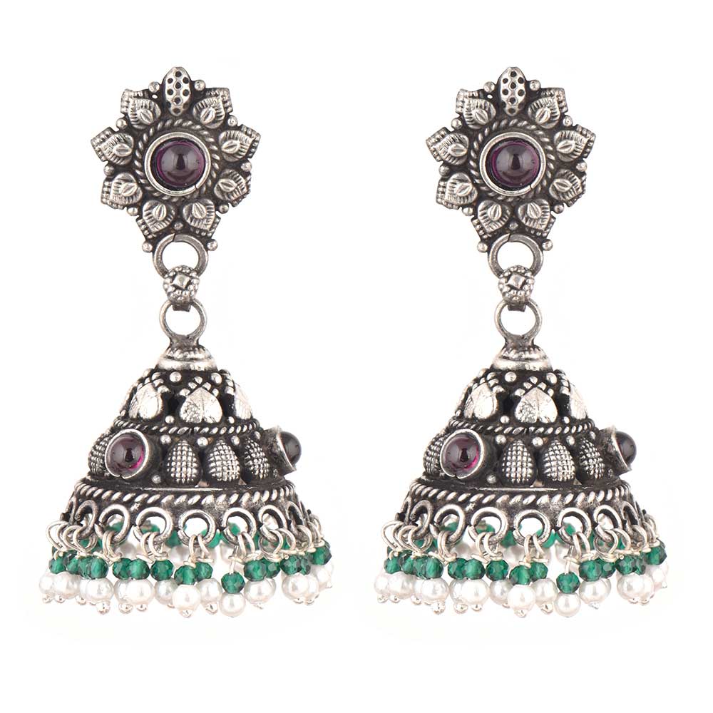 Side profile showing the handcrafted floral motif and amethyst onyx detail