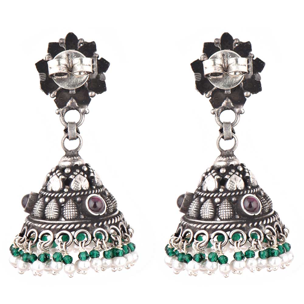 Close-up of intricate floral engraving with amethyst onyx accents