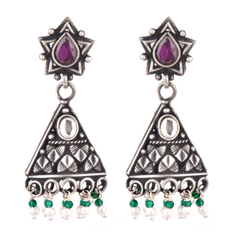 Side profile showing Peridot & Amethyst on the earrings