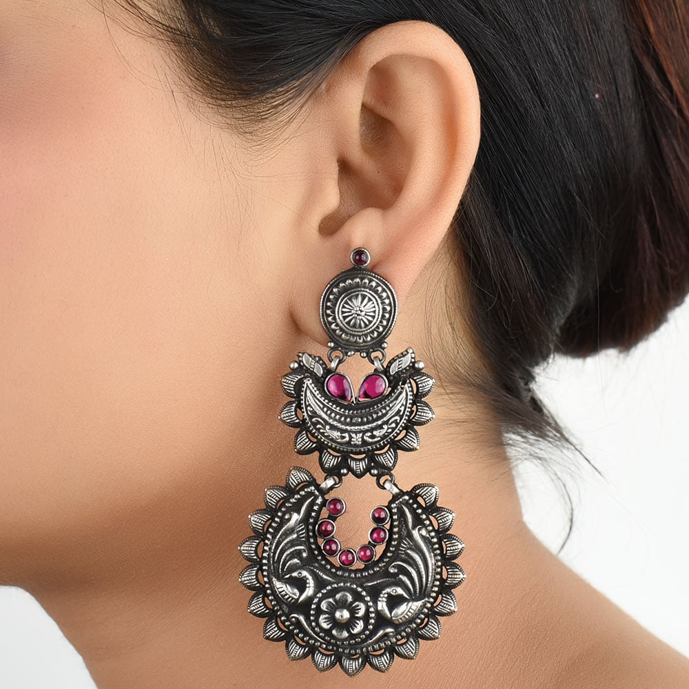 Front view of peacock dangle earrings in 92.5 Sterling Silver