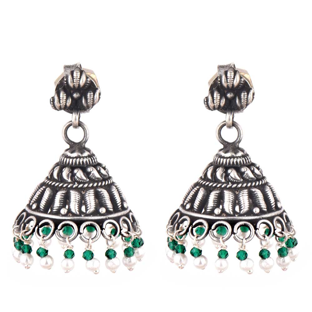 Side profile showing Pearl on the earrings