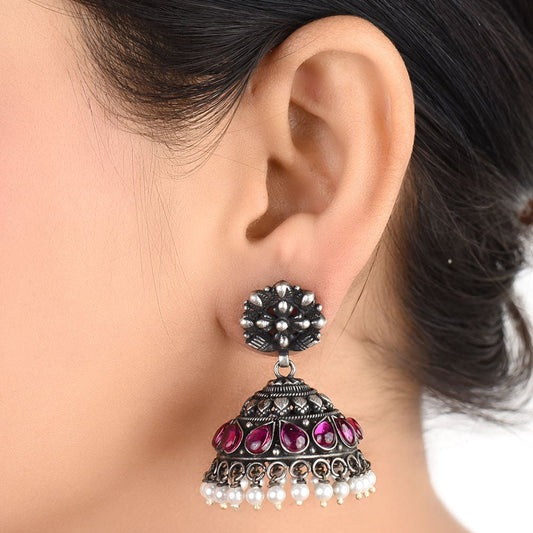Front view of floral stud earrings in 92.5 Sterling Silver