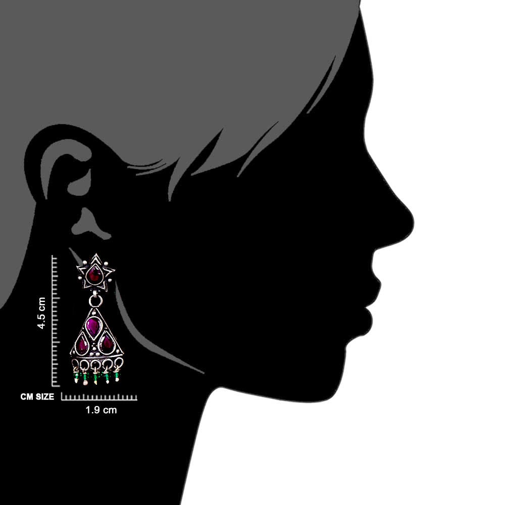 Artisan hands crafting the jhumki jhumki earrings