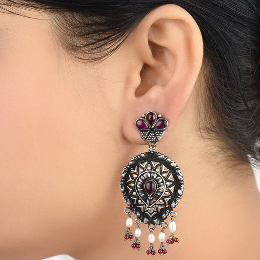 Front view of Gul Amethyst floral, amethyst stud earrings in 92.5 Sterling Silver