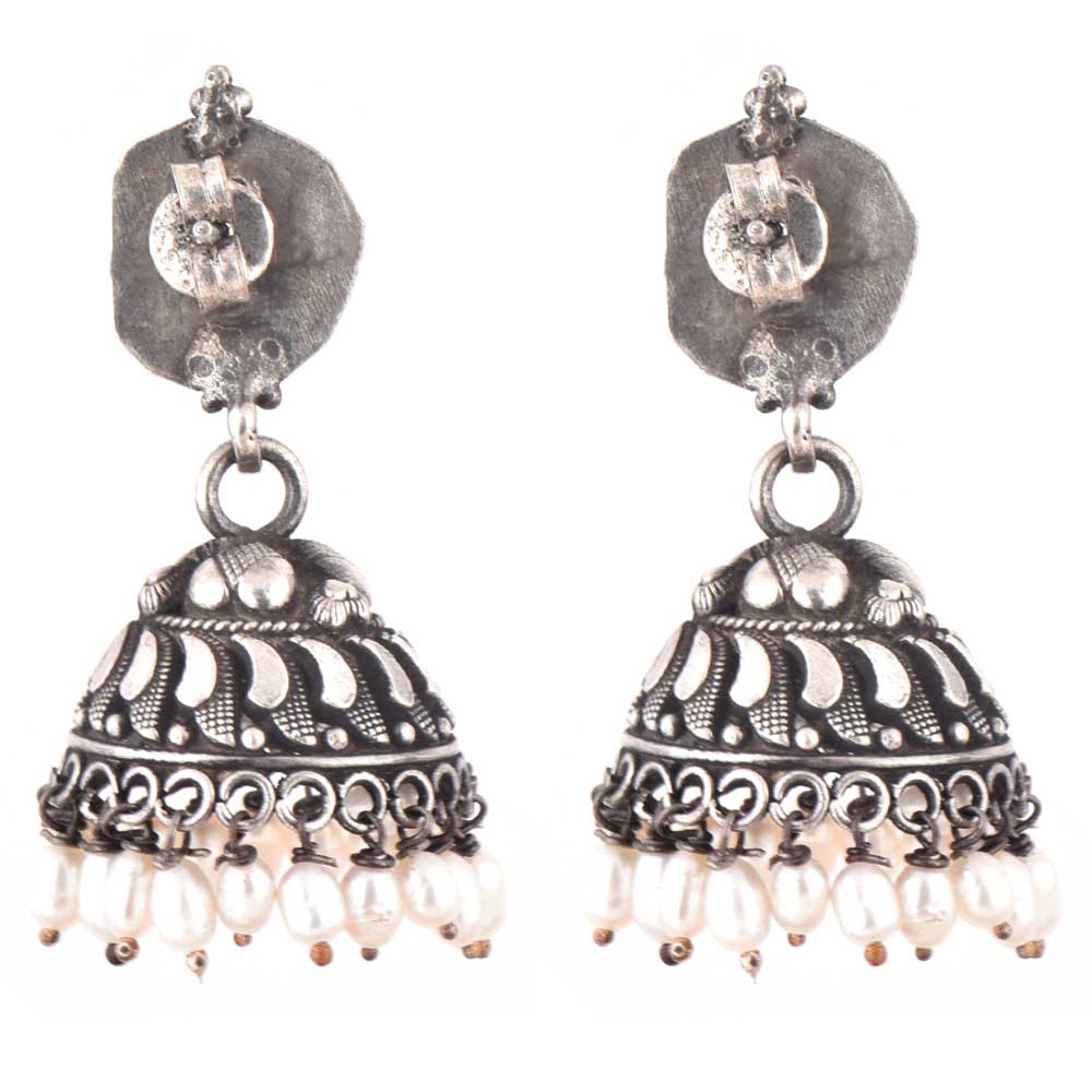 Close up of handcrafted fish, pearl pattern set in 92.5 Sterling Silver