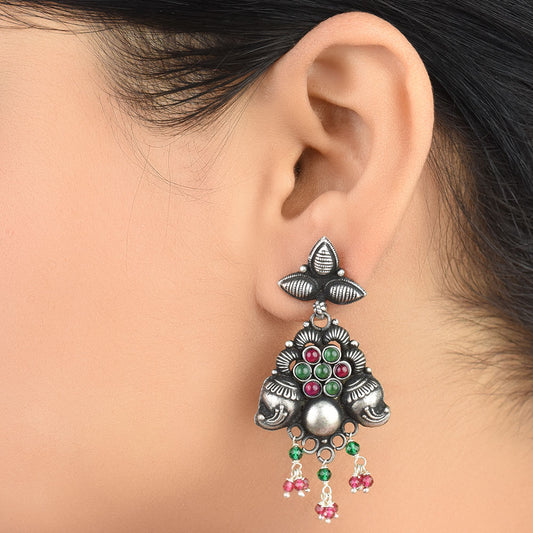 Front view of Vanika Jade leaf, onyx, jade dangle earrings in 92.5 Sterling Silver