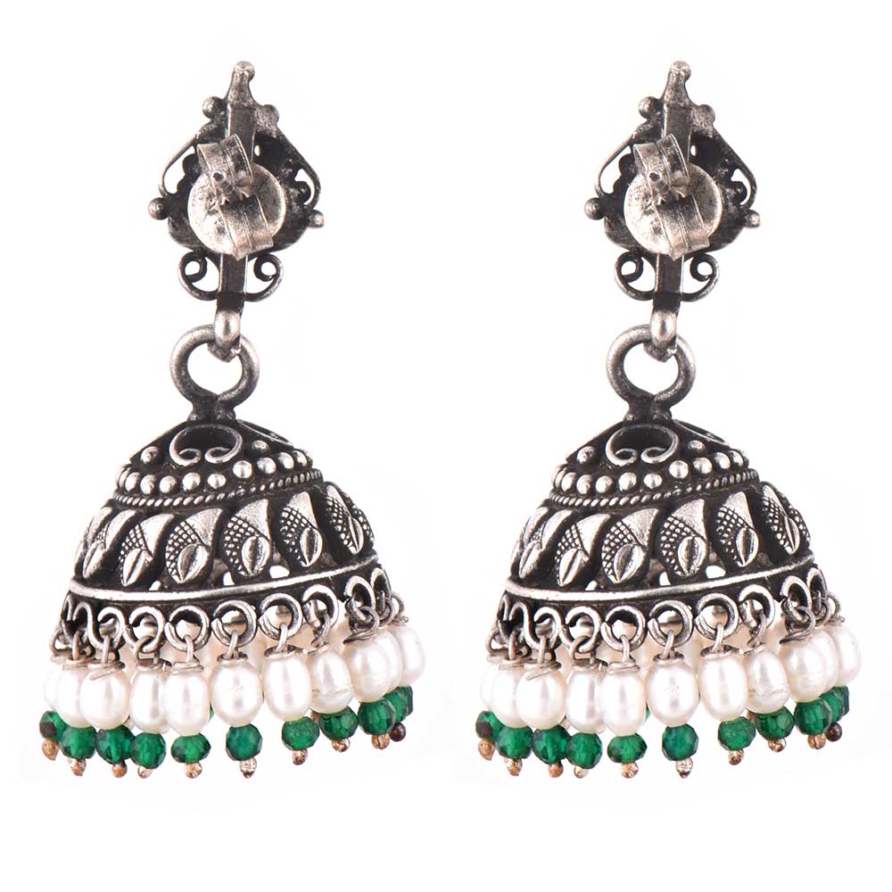 Close up of handcrafted tribal, pearl, onyx pattern set in 92.5 Sterling Silver