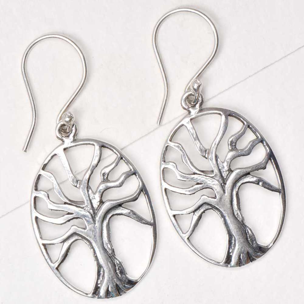 Side view showing tree of life, round design on Reet earrings