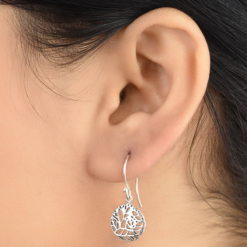 Front view of Reet geometric pattern, round, drop drop earrings in 92.5 Sterling Silver