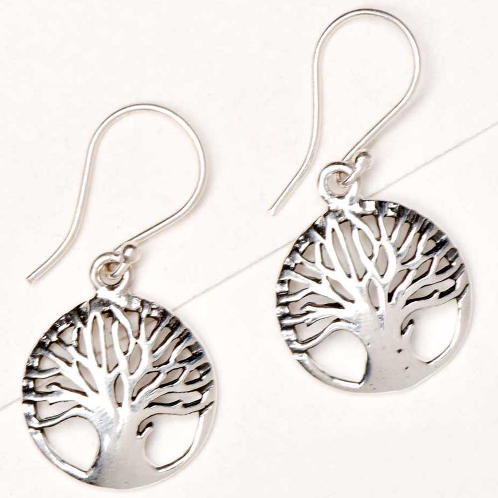 Side view showing tree of life, round, drop design on Reet drop earrings