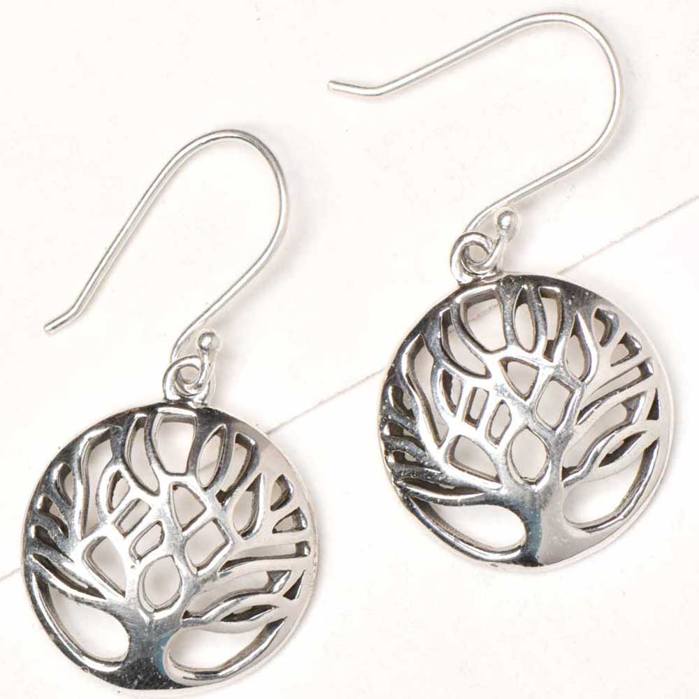 Side view showing tree of life, round design on Reet earrings