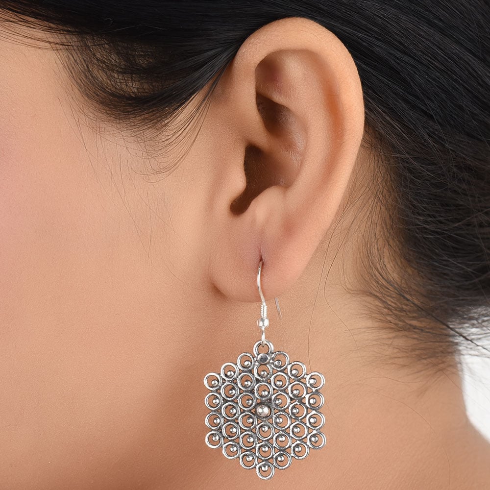 Front view of honey and comb and bee honey bee comb dangle earrings in 92.5 Sterling Silver