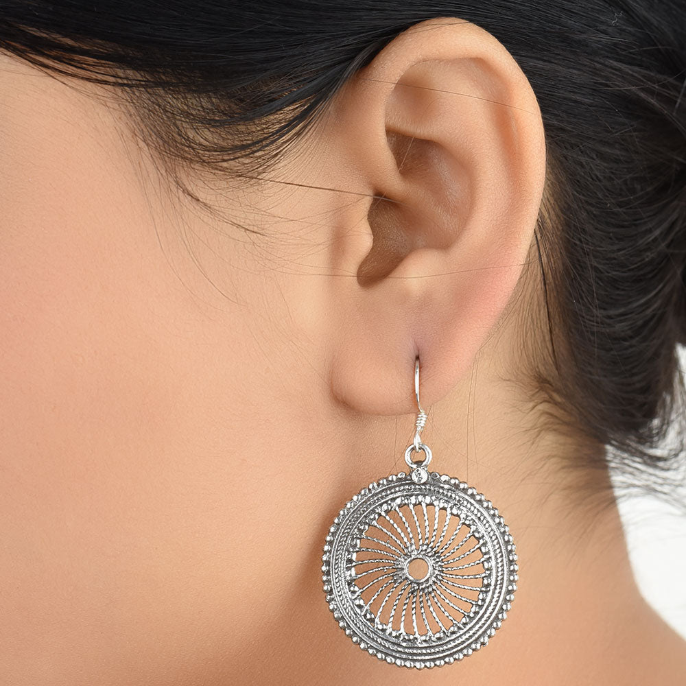 Front view of Reet round dangle earrings in 92.5 Sterling Silver