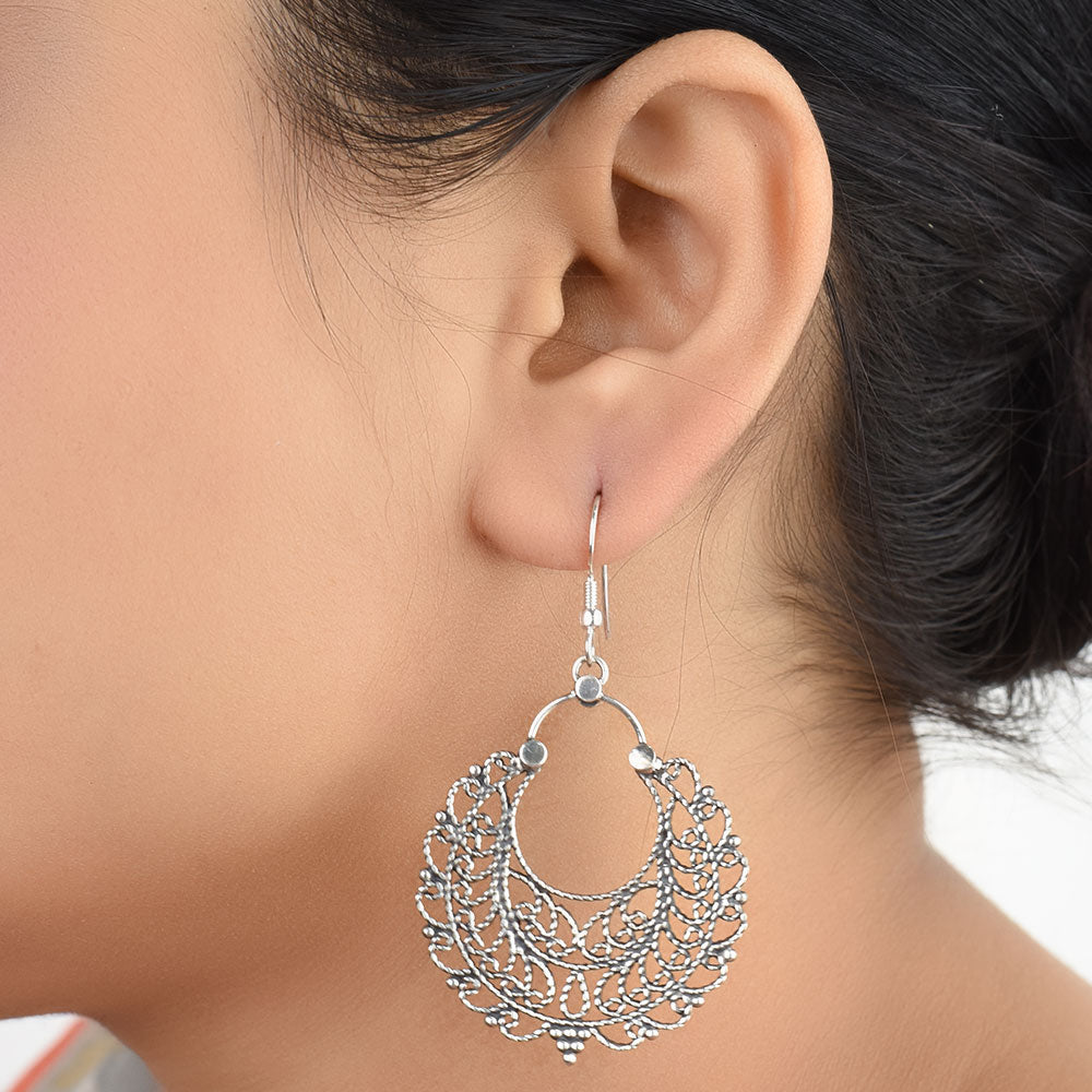 Front view of Banjara tribal, filigree, drop drop earrings in 92.5 Sterling Silver