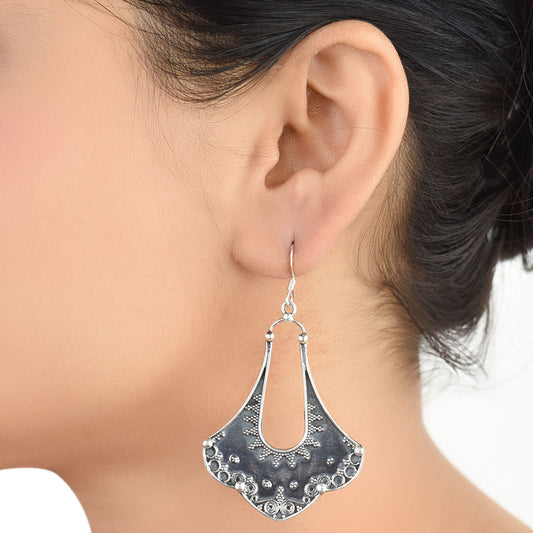 Front view of Banjara tribal, petal dangle earrings in 92.5 Sterling Silver
