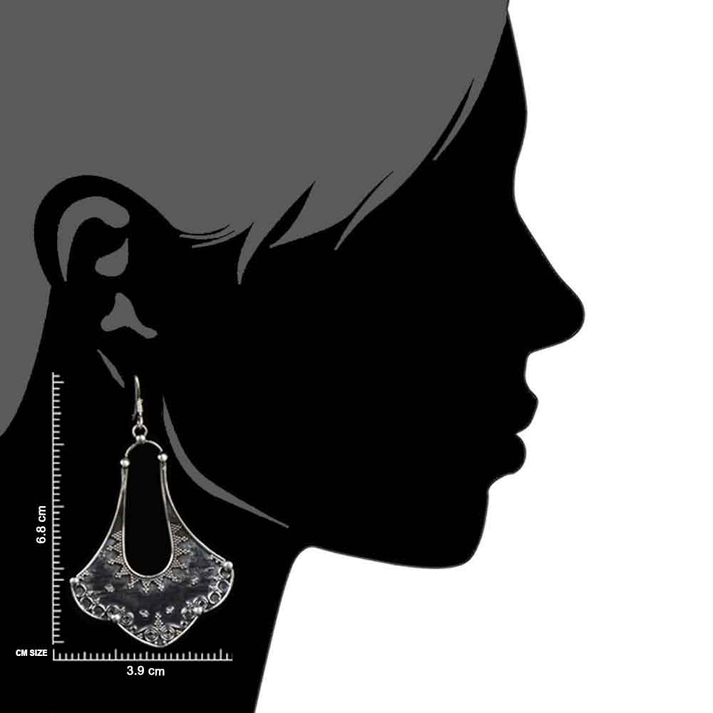 Close up of handcrafted tribal, petal pattern set in 92.5 Sterling Silver