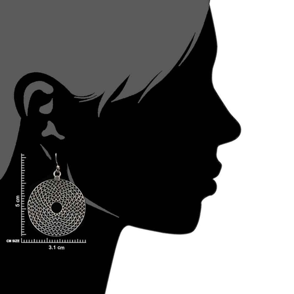 Close up of handcrafted round pattern set in 92.5 Sterling Silver