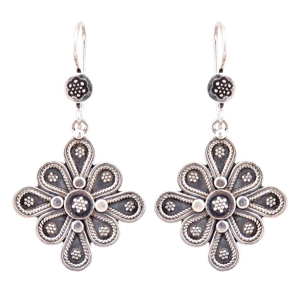 Side view showing floral design on Gul dangle earrings