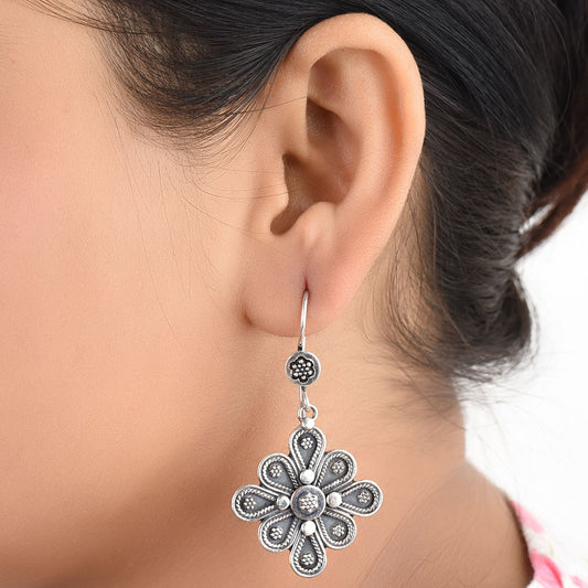 Front view of Gul floral dangle earrings in 92.5 Sterling Silver