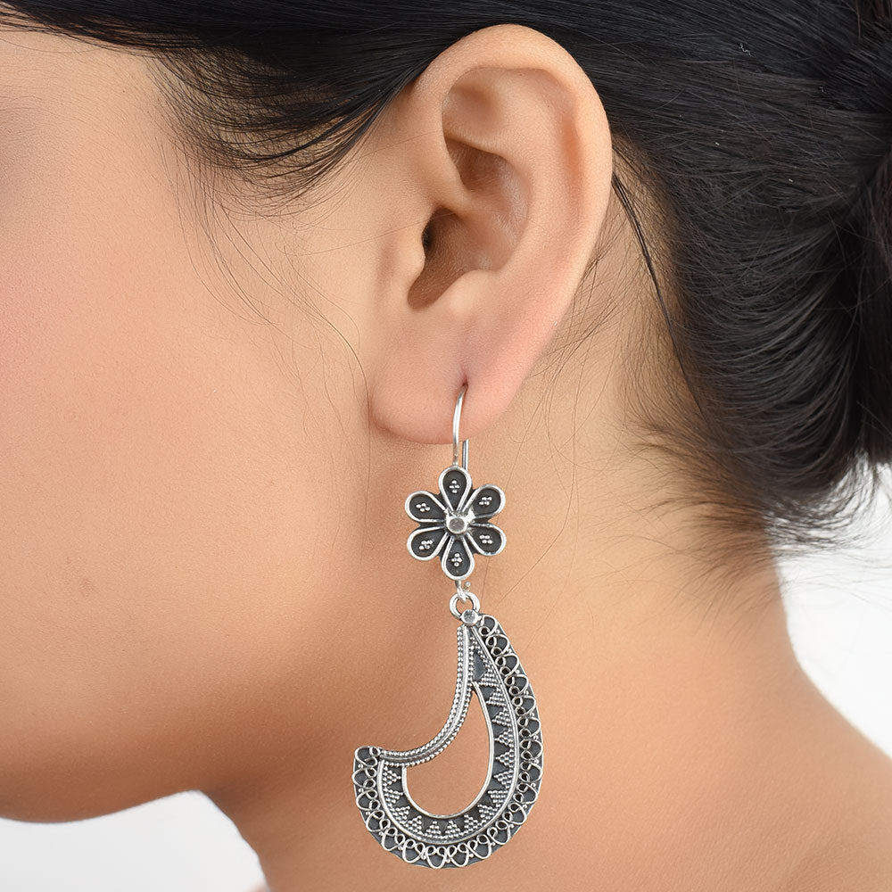 Front view of Banjara tribal dangle earrings in 92.5 Sterling Silver