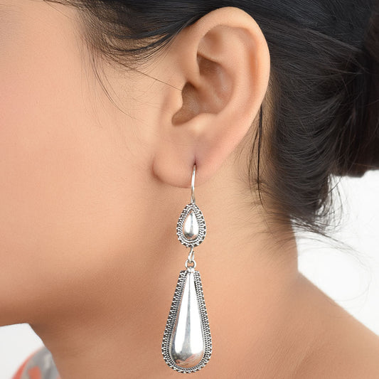 Front view of Banjara Pearl tribal, pearl stud earrings in 92.5 Sterling Silver