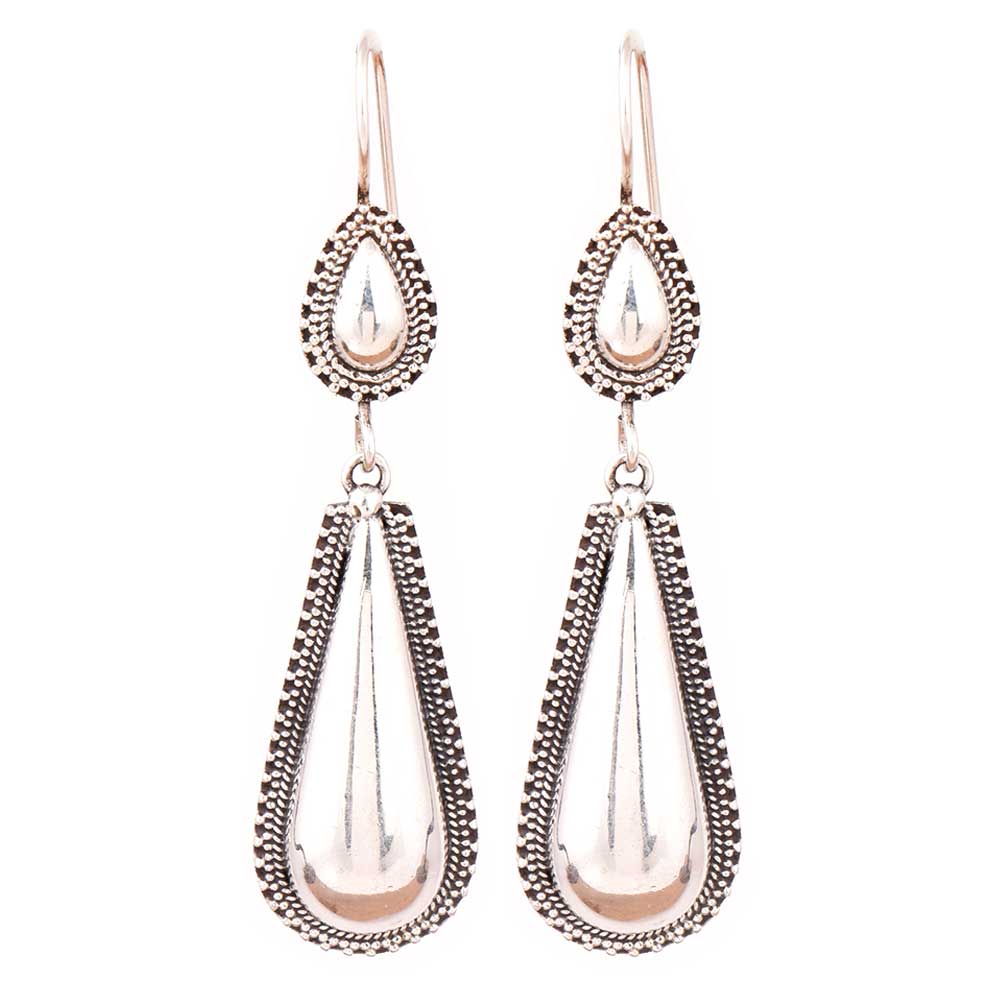 Side view showing tribal, pearl design on Banjara Pearl stud earrings