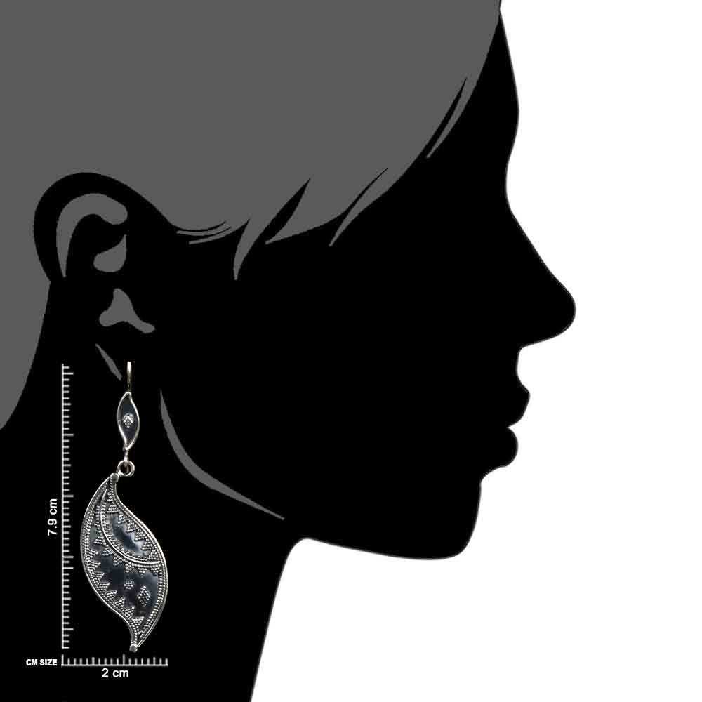 Close up of handcrafted leaf pattern set in 92.5 Sterling Silver